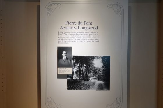 a sign with historic photos from Longwood Gardens