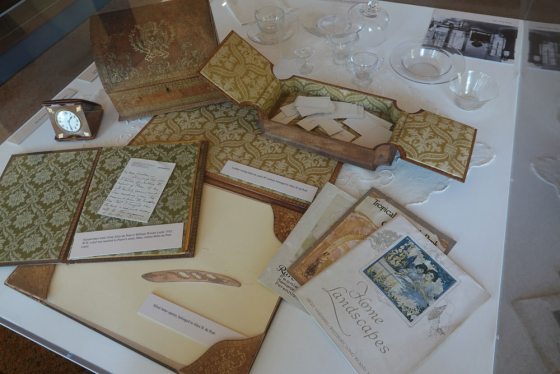 historic books, folders and glassware 