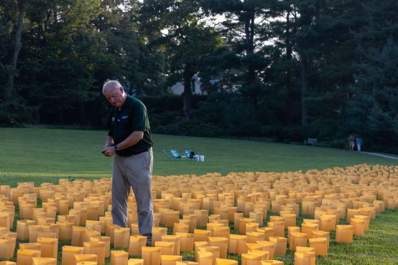 A person surrounded by luminarias 