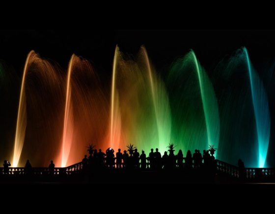 fountains illuminated in a rainbow of colors 