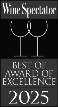Vertical banner with white lettering against a purple background that reads "Wine Spectator Best Of Award of Excellence 2025," with white line drawing of 2 wine glasses against a black background.