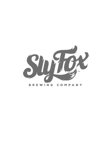 Logo in large red cursive lettering for "Sly Fox" Brewing Company.